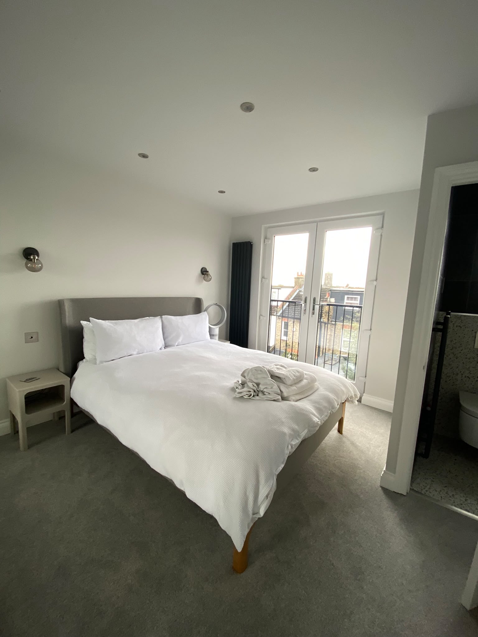 Finished loft bedroom with Juliet balcony and en-suite