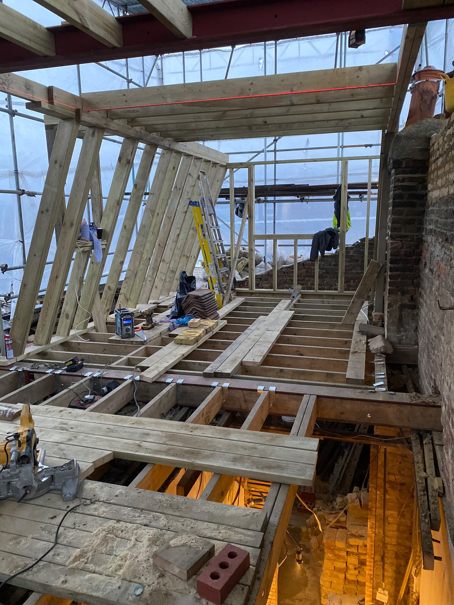 Mansard timber frame under construction