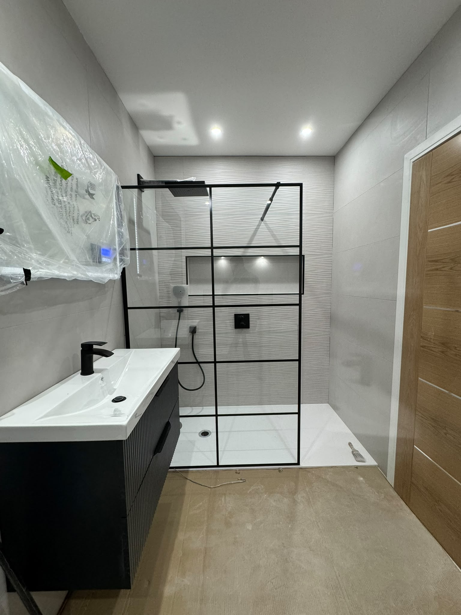 Completed walk-in shower room