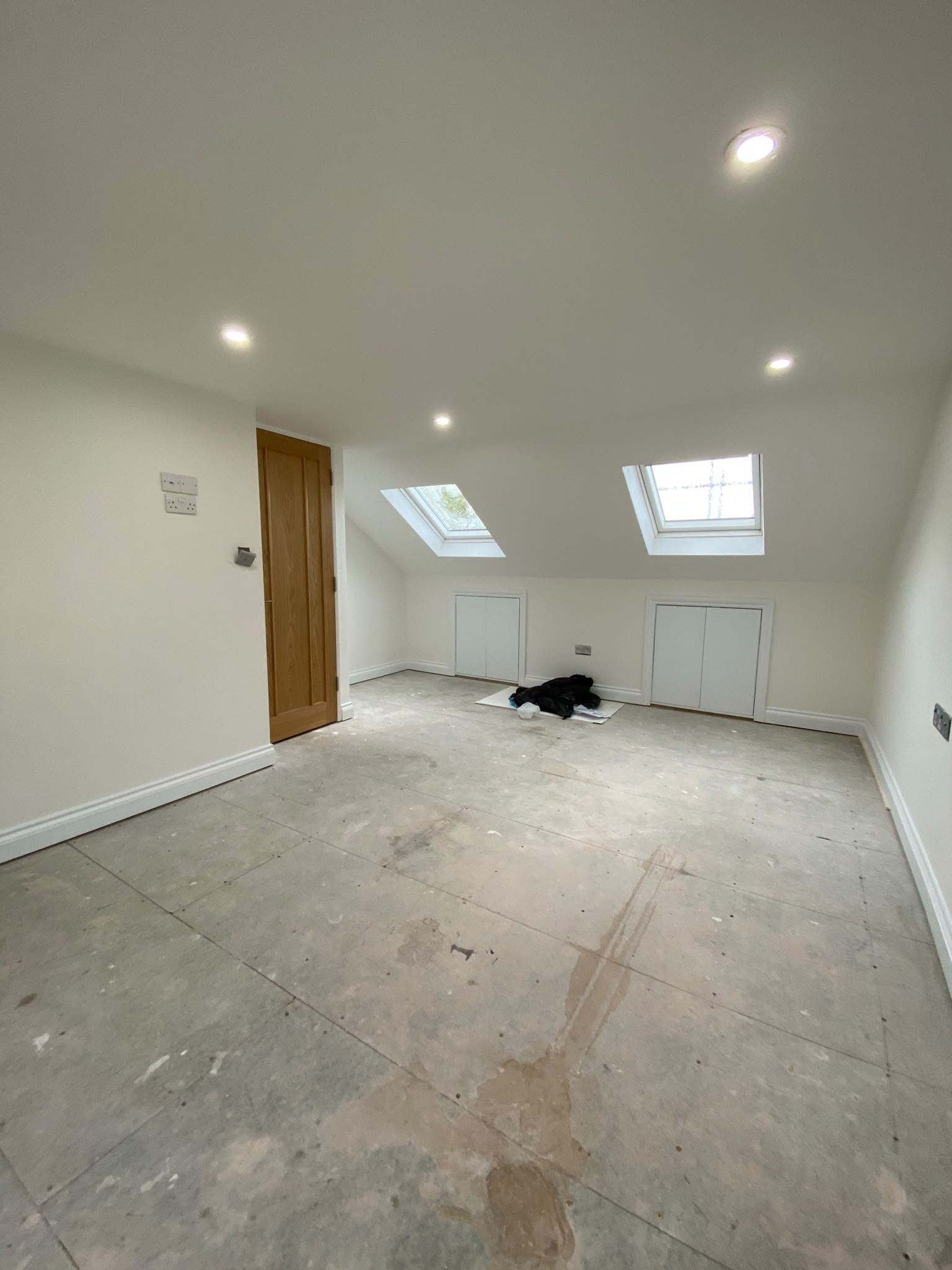 Bright completed loft room with rooflights